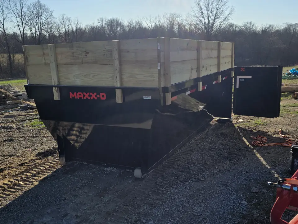 Hurst Earthworks 20-yard dumpster with the barn-style rear door open